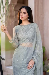 Front view of grey sequins embroidered net gown - Pakistani bridal wear with floral sequins embroidery on bodice and full skirt