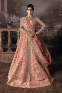 Peach bridal lehenga full look with gold jewelry