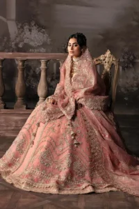 Peach bridal lehenga sleeve and neckline embroidery
