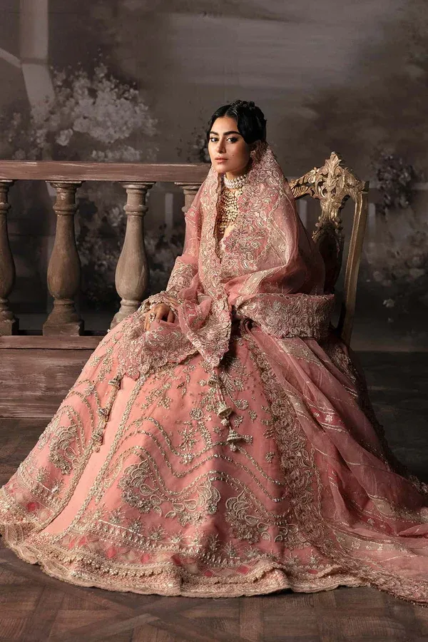 Peach bridal lehenga sleeve and neckline embroidery