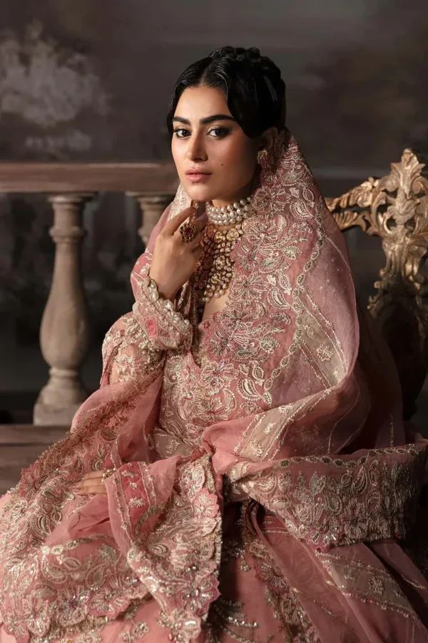 Peach bridal lehenga sleeve and neckline embroidery