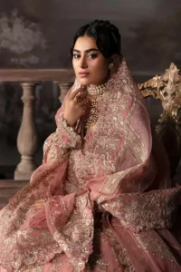 Peach bridal lehenga sleeve and neckline embroidery