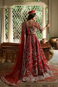 Red bridal lehenga full look with bridal jewelry